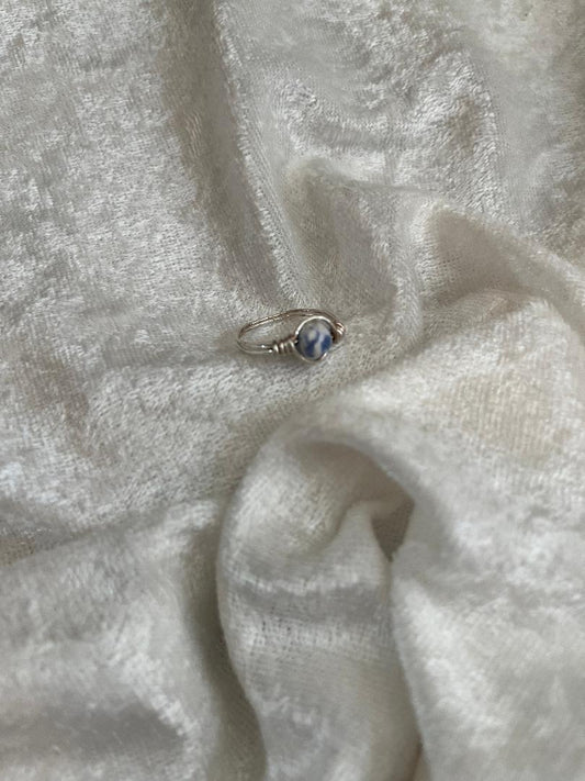 Ring silver wrapped blue white gemstone